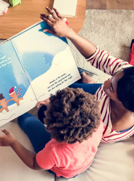 Mother and child reading a book Mother and child reading a book